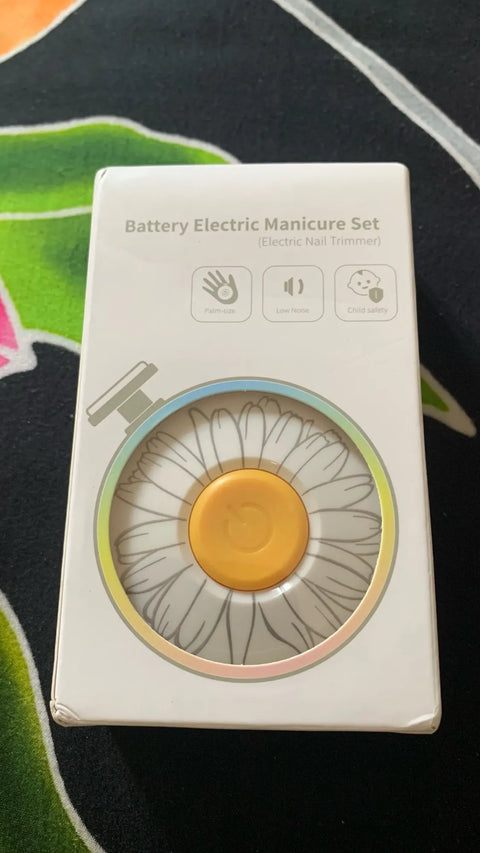 Buyer photo of the trimmer held in one hand