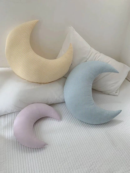 Small and large moon cushion sizes compared side by side