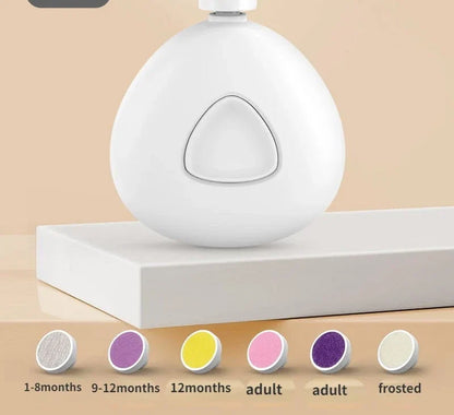 The trimmer in white, shown with all six filing pads