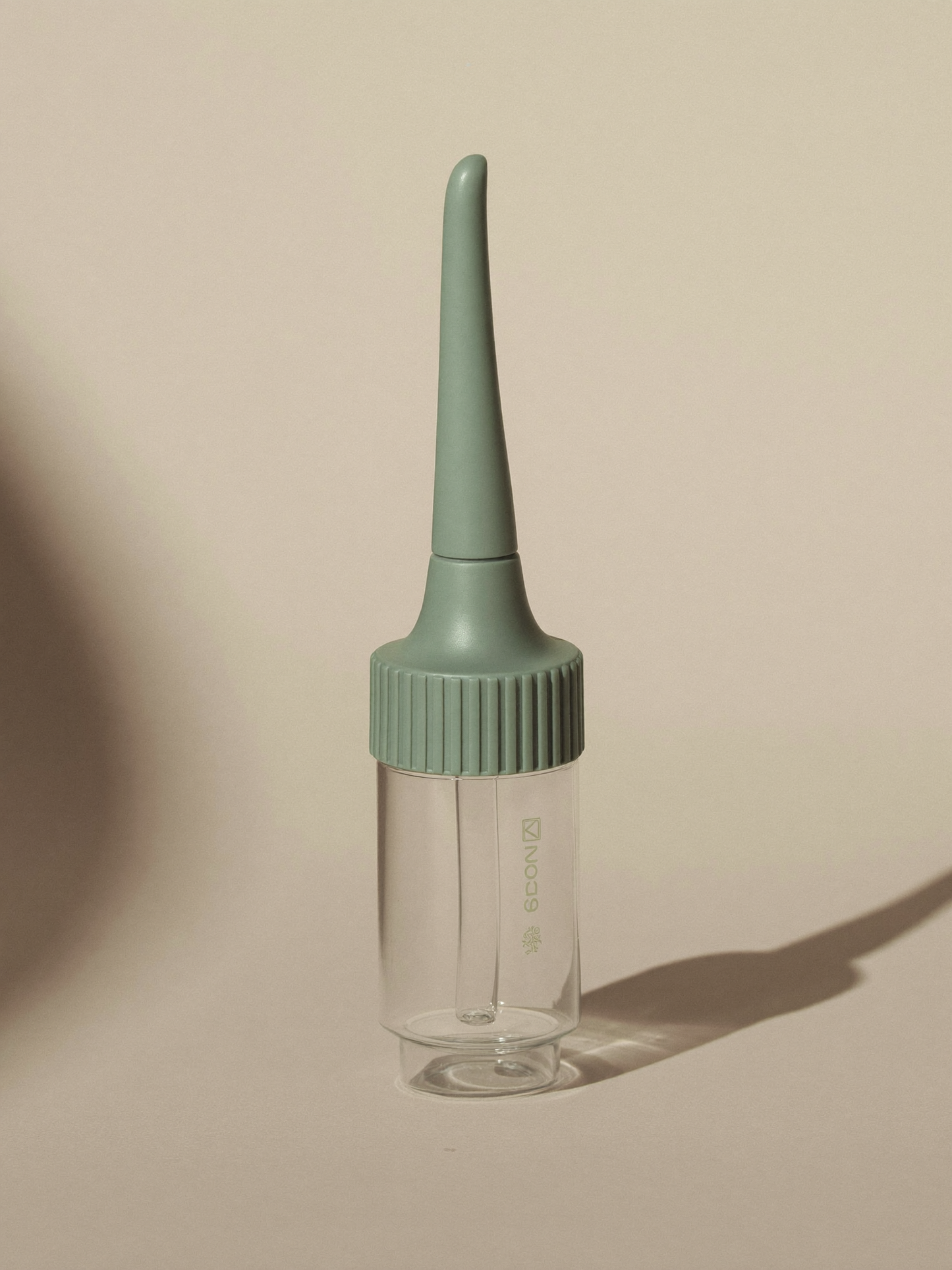 PLACEHOLDER (AI-generated) - Silicone nasal aspirator on cream