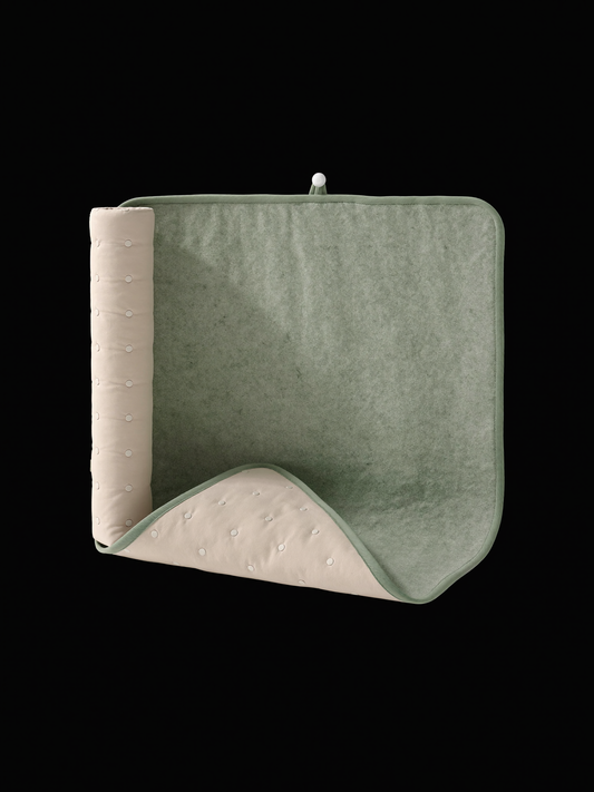 PLACEHOLDER (AI-generated) - Folded portable changing mat on cream