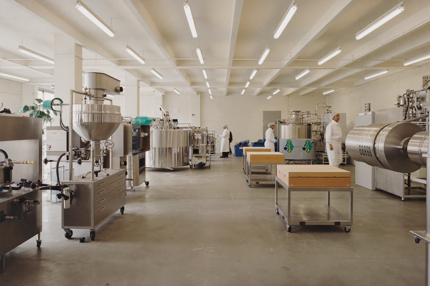A clean manufacturing facility with stainless steel production equipment
