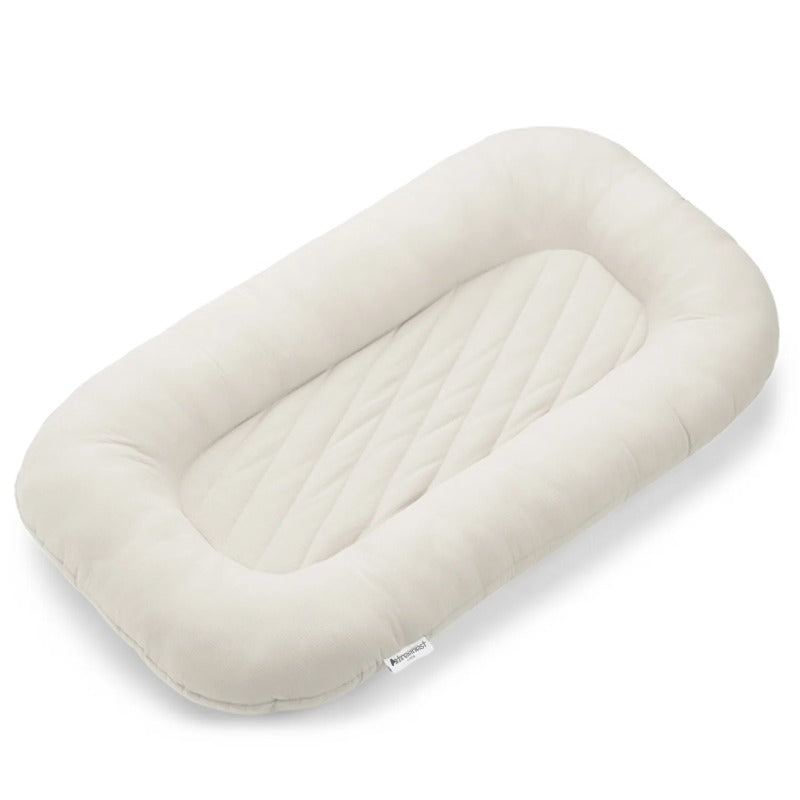 Both Hands Baby Lounger in Oat, cream cotton lounger on a white background